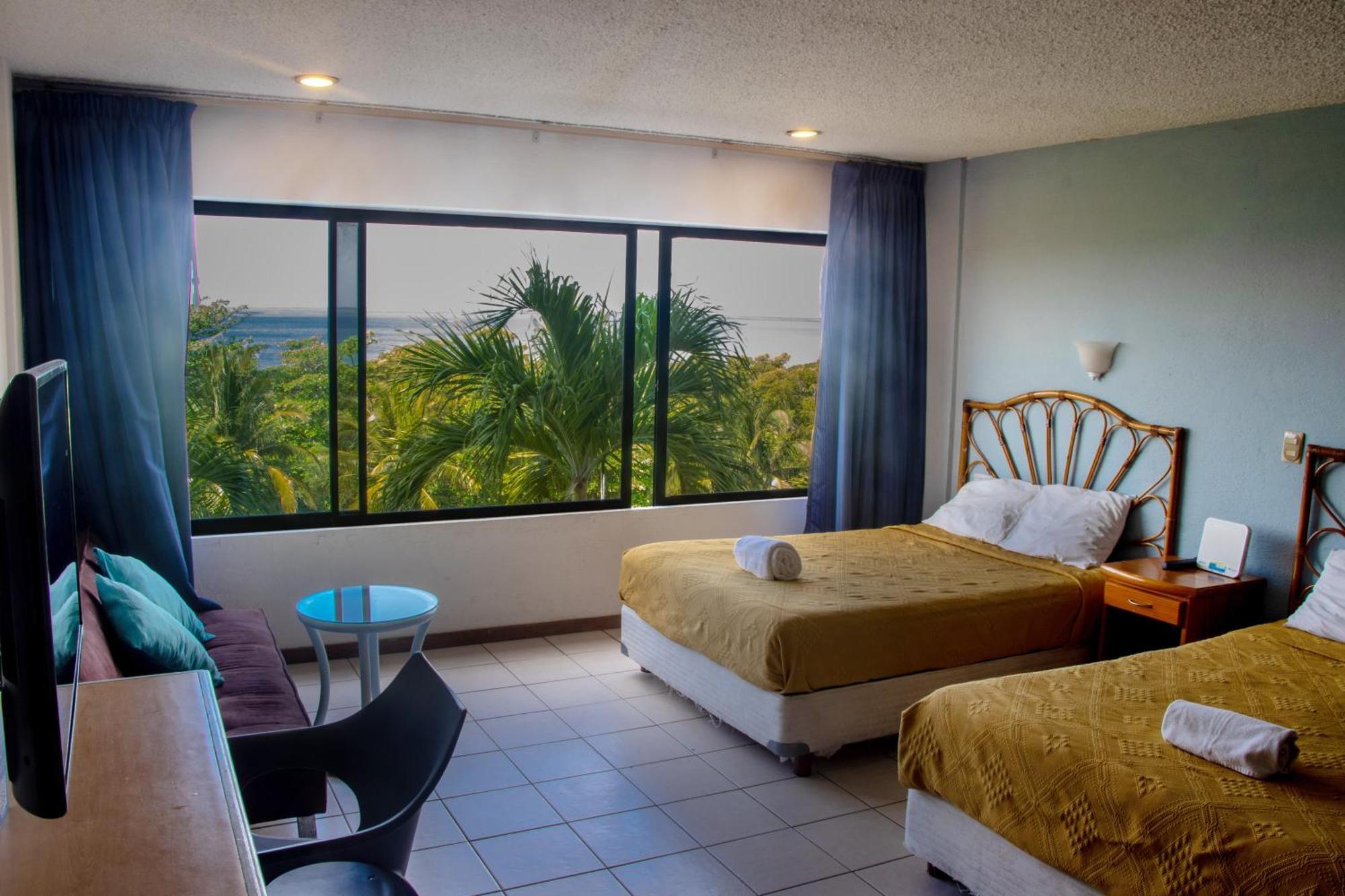 Beachfront Apartments Cancún Rom bilde