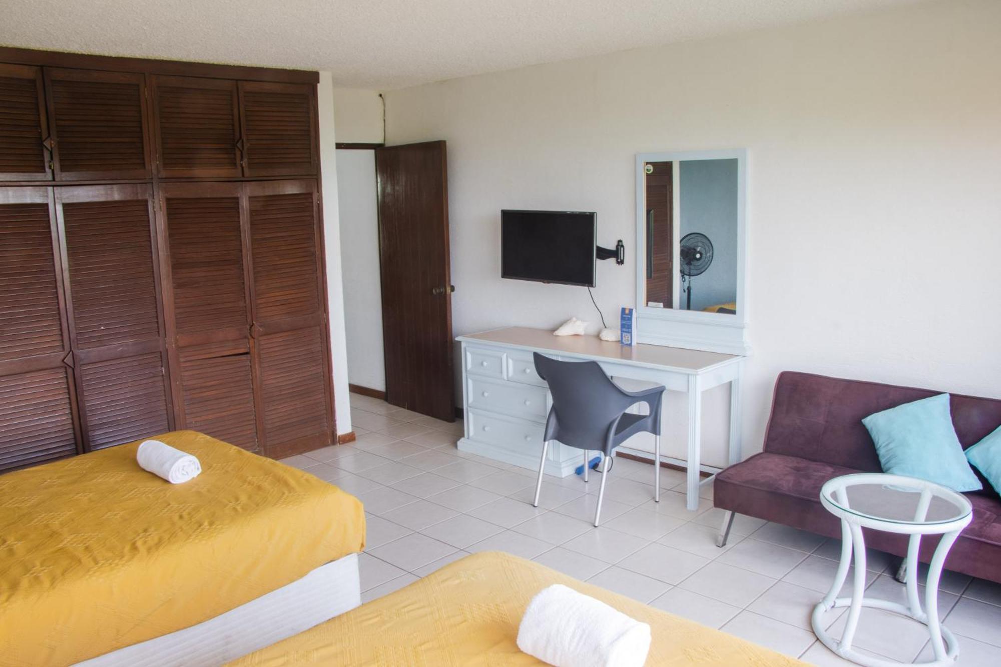 Beachfront Apartments Cancún Rom bilde