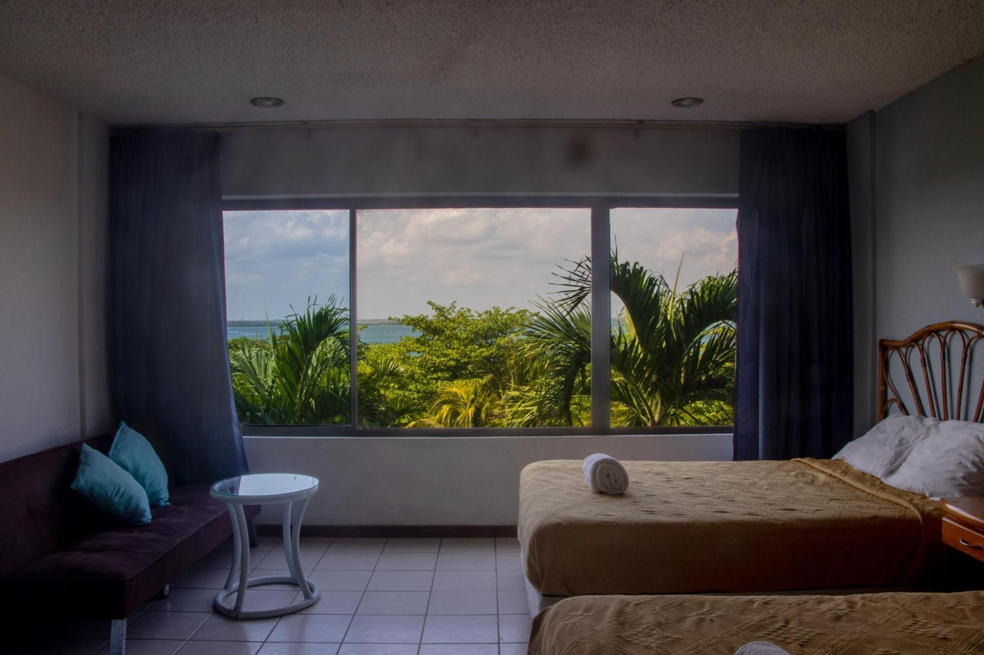 Beachfront Apartments Cancún Rom bilde